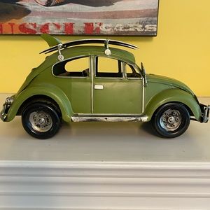 Green metal VW with surfboards like new